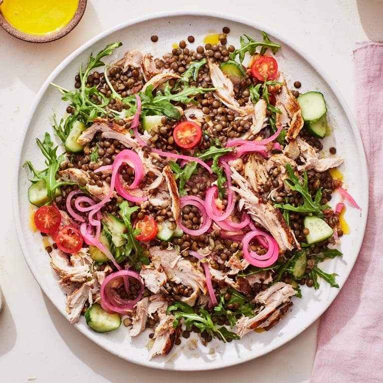 Hearty Lentil & Chicken Spring Salad plated with a light mustard dressing, ready for a protein-packed, gluten-free dinner.
