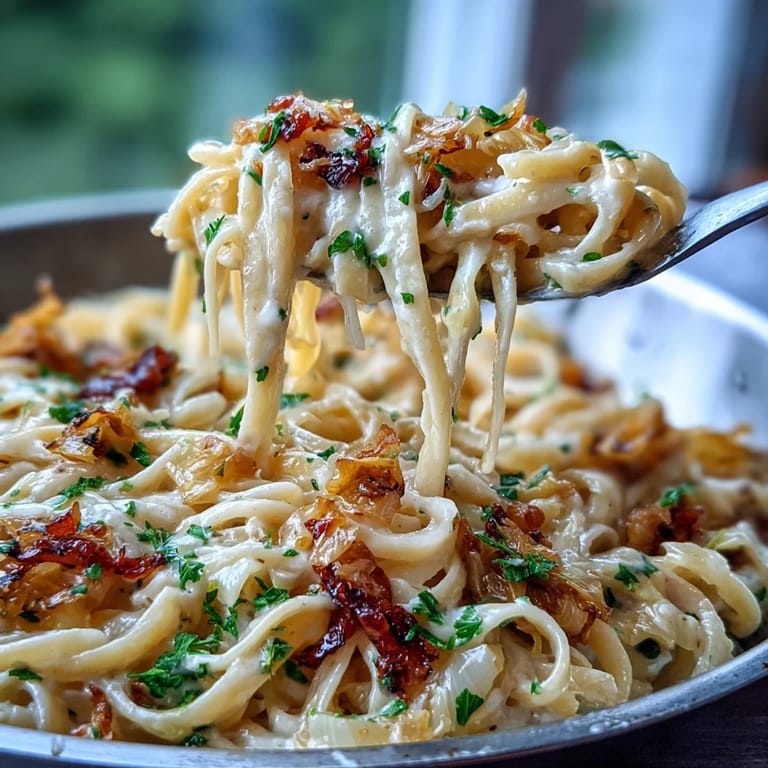 Golden Caramelized Cabbage Carbonara, tossed with smoky sauce and pasta.